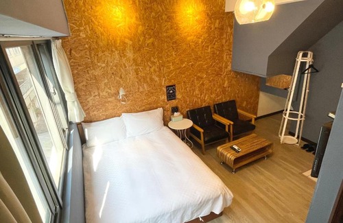University District Apartment | Welcoming Grey Bear Hotel Near Taichung Night Market