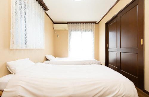 Shinagawa Apartment | Eco-Friendly Stay at Shinagawa Wisteria Residence