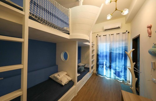 Shanjiao House | Discover Blue Hole Backpacker Inn: Family-Friendly Retreat
