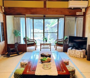 Kani Villa | Indulge in Relaxation at 大正の宿 浪漫邸 with Hot Tub