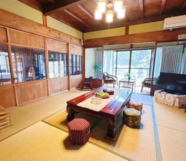 Kani Villa | Indulge in Relaxation at 大正の宿 浪漫邸 with Hot Tub