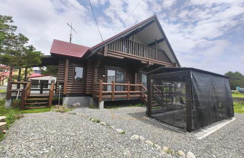 Shiraoi House | 天然温泉付快適なログハウス ヴィレッジR 屋根付bbq設備あり