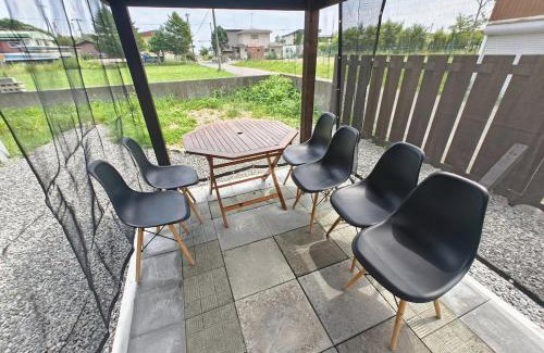 Shiraoi House | 天然温泉付快適なログハウス ヴィレッジR 屋根付bbq設備あり
