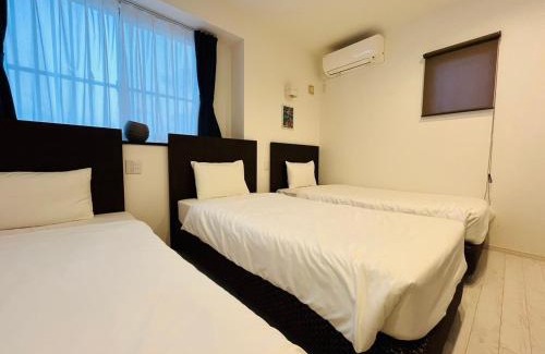 Shikenbaru Apartment | Explore 奥武島の浅築マンション with Ocean Terrace & BBQ