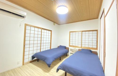 Amami House | Island Retreat Yuinch: Rated 10/10 with Oceanfront Views