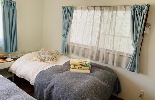 Izumisano House | Ocean View Retreat at 幽舍の庭: Family-Friendly Escape