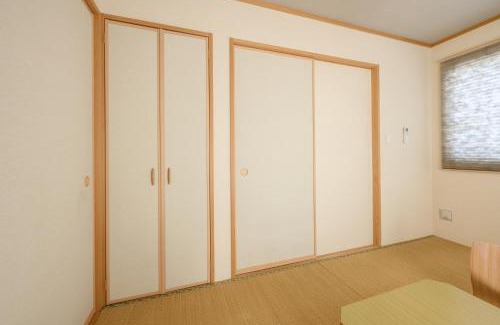Inamine House | Ideal Getaway for 12: Enjoy Comfort Near South Wind House