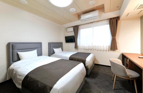 Otaru Hotel | Serene Morning at 朝里川温泉ホテル - Spa & Family Friendly