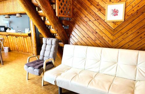 Shiraoi House | Experience Joyful Stays at Hot Springs Log House Retreat