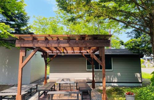 Shiraoi House | Experience Joyful Stays at Hot Springs Log House Retreat