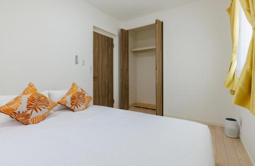 Gushikawa House | 沖縄うるま市 最大9名OK BBQ 徒歩1分で天然ビーチ 広々3部屋の快適ステイ Villa Ohana