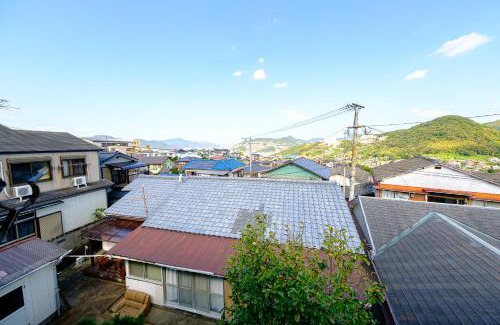 Nagasaki House | Cozy 渡邊民泊: Pet & Child Friendly Retreat