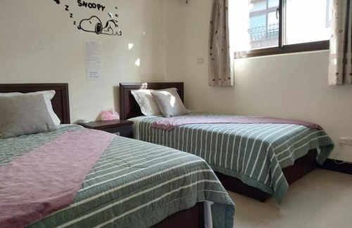 Jinning Villa | Seaside Haven: Child-Friendly Stay with Kitchen Amenities