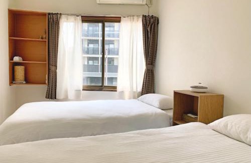 Minami House | Top-Rated Sakura & Maple Guest House with Hot Tub Access