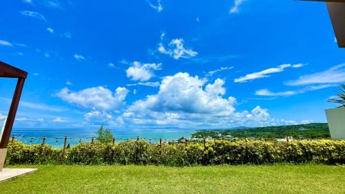 Kadena-cho Villa | Explore Comfort at 読谷目黒や: Pet-Friendly & Pool Access