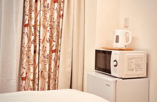 Chuo Apartment | Modern Tokyo Retreat near Akihabara with Hot Tub Access