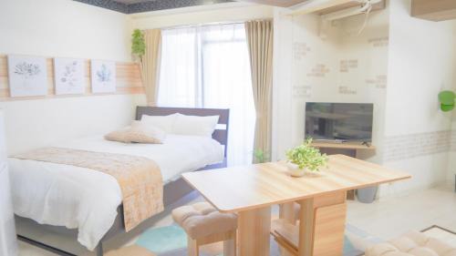 Shikitsuhigashi Apartment | Close to Ōkuchi Station: Family-Friendly Guest House HARAYA