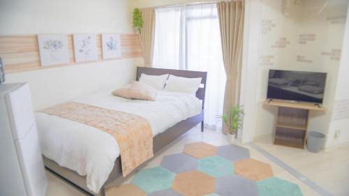 Shikitsuhigashi Apartment | Close to Ōkuchi Station: Family-Friendly Guest House HARAYA