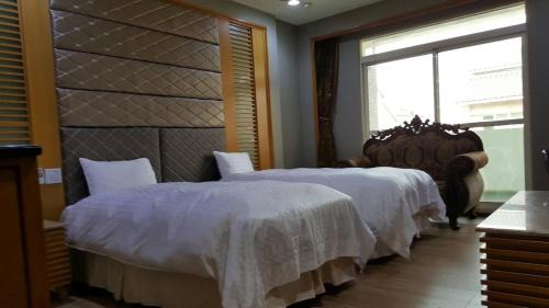 Douliou Hotel | Inviting Yulin Douliu Garden Motel: Pet-Friendly Retreat