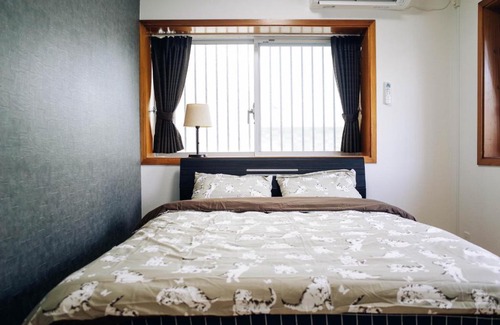 Ginowan Villa | Beachfront Retreat: Pension Seiran Just 50m from the Shore