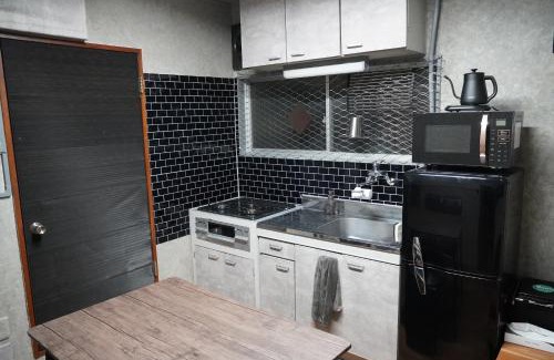 Kaigan Apartment | Convenient Stay Near Rainbow Bridge with Rooftop Views