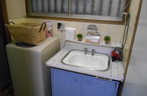 Asahi Apartment | Convenient Glamping House with Garden Near Osaka Station