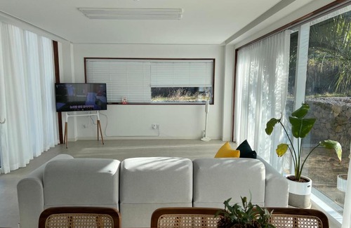 Hallim Apartment | Explore 하솜별담: Relax by the Inviting Pool