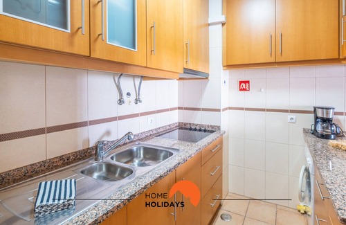 Areias de Sao Joao Apartment | Explore Center City: AC, Shared Pool & Top-Rated Stay