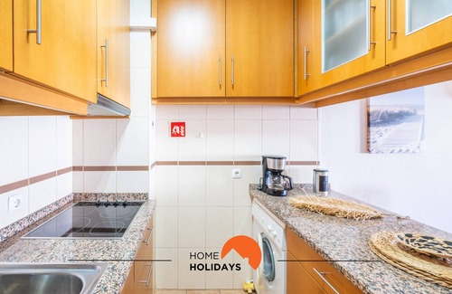 Areias de Sao Joao Apartment | Explore Center City: AC, Shared Pool & Top-Rated Stay