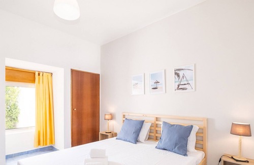 Castelo Apartment | Cozy Getaway with Private Porch, Steps from the Beach