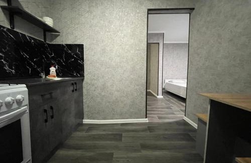 Petropavlovsk Apartment | Central City Apartment with Kitchen and Family-Friendly Vibe