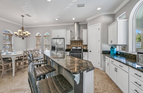 Emerald Waters Village House | Beachside Retreat: 7 BR with Theater & Private Pool