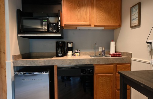 Mancelona Condo | Mountain View Retreat with Pools and Spa Amenities