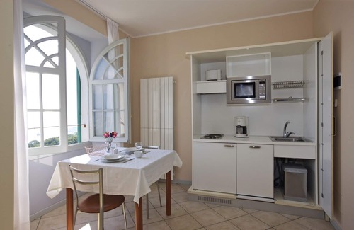 Carciano Apartment | 1-bedroom apartment in an Art Nouveau villa with communal pool