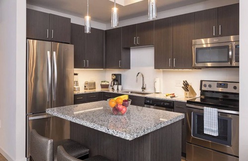 Civic District Condo | Deluxe 1 Bedroom Condo w/ Kitchen - Ideal for Families