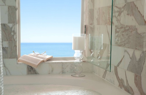 Connors Hotel | Elegant 1-Bedroom Suite with Ocean View & Pool Access