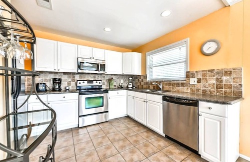 Pirates Beach House | Beach Block Oasis with Gulf Views & Pet-Friendly Amenities