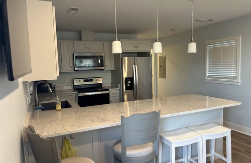 Emerald Isle Apartment | Ocean View 1 BR Apartment with Breakfast & Pet-Friendly Access