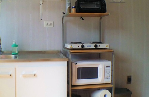 Guachipelin Apartment | Cozy Container Studio with Scenic Views & Great Amenities