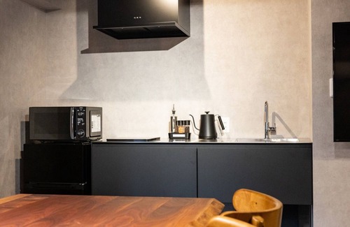 Niyodogawai Onsen Apartment | Explore 74 Grande Room in Kochi with Family-Friendly Amenities