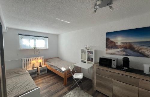 Eichsfelder Kessel Apartment | Child-Friendly 1-Raum Ferienwohnung in Niederorschel