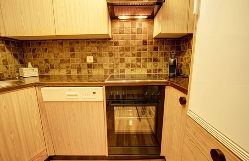 Silvaplana Apartment | Cozy Garden View Flat with Spa & Child-Friendly Amenities