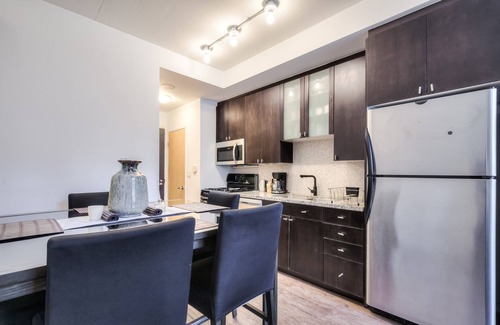 King West Village Condo | Elegant 1 Shaw St Loft Suites with Breakfast & Family Amenities