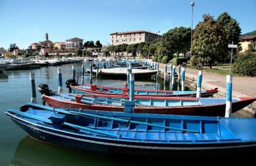Clusane Apartment | Relaxing Retreat at 1 STEP ON THE LAKE - Pet Friendly Stay