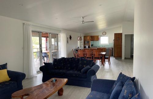 Wooli House | Relax at 1 Tree Escape: Ocean Views & Pet-Friendly Stays