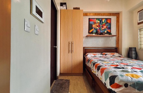 Iloilo Apartment | Urban Elegance: Guest Rated 9.3 with Pool & Pet-Friendly
