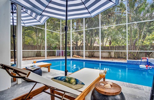 Palm Harbor House | Convenient Getaway: Pool, Hot Tub & Game Room Near Beach!