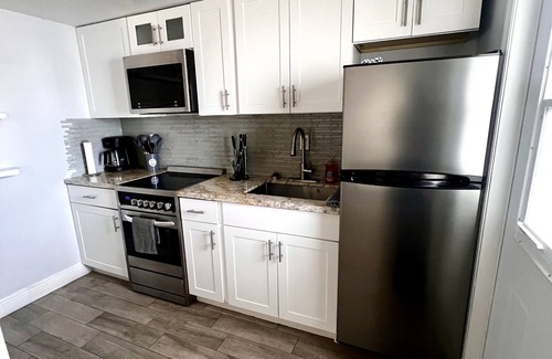 Downtown Condo | Modern Condo with Pool, Beach Just 10 Minutes Away