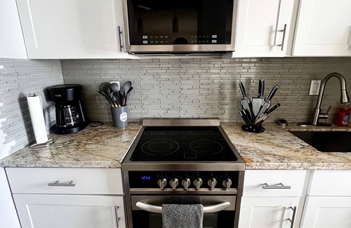 Downtown Condo | Modern Condo with Pool, Beach Just 10 Minutes Away