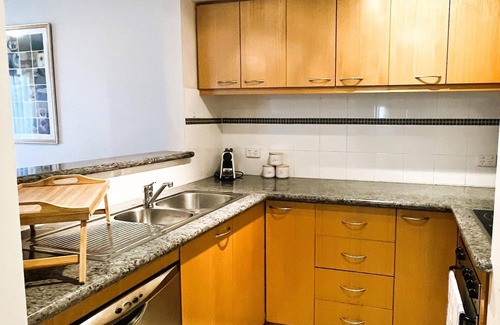 Perth Central Business District Apartment | Charming 2BR City Resort with Pool and Gym Access